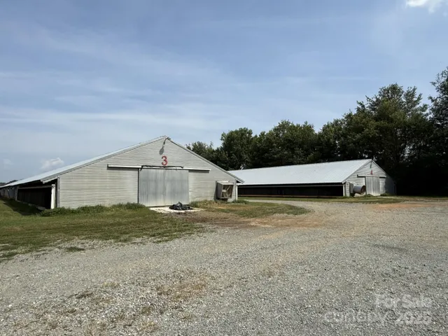 a view of swimming pool in front of lake