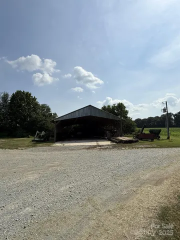 a view of a lake with a yard