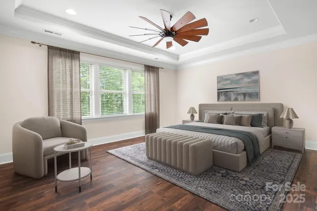 a spacious bathroom with double sink and a large mirror