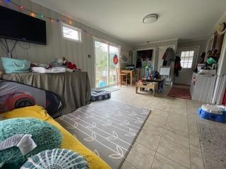 2339 Shirley Road Wilmington, NC 28405 - Photo 10 of 17 large family room with laundry closet at the other side.