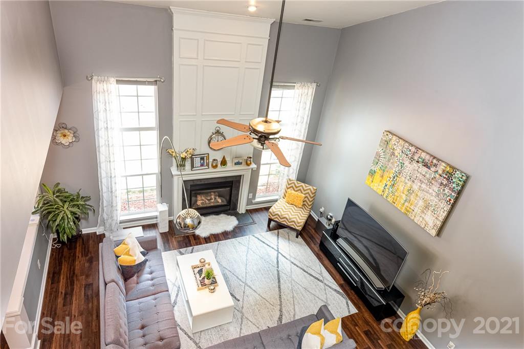 9239 Hillston Ridge Road Huntersville, NC 28078 - Photo 2 of 38 a living room with furniture and a fireplace