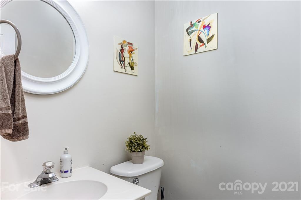 9239 Hillston Ridge Road Huntersville, NC 28078 - Photo 16 of 38 a bathroom with a toilet and a sink
