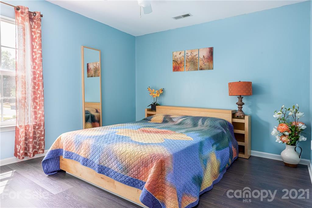 9239 Hillston Ridge Road Huntersville, NC 28078 - Photo 23 of 38 a bedroom with bed and a window