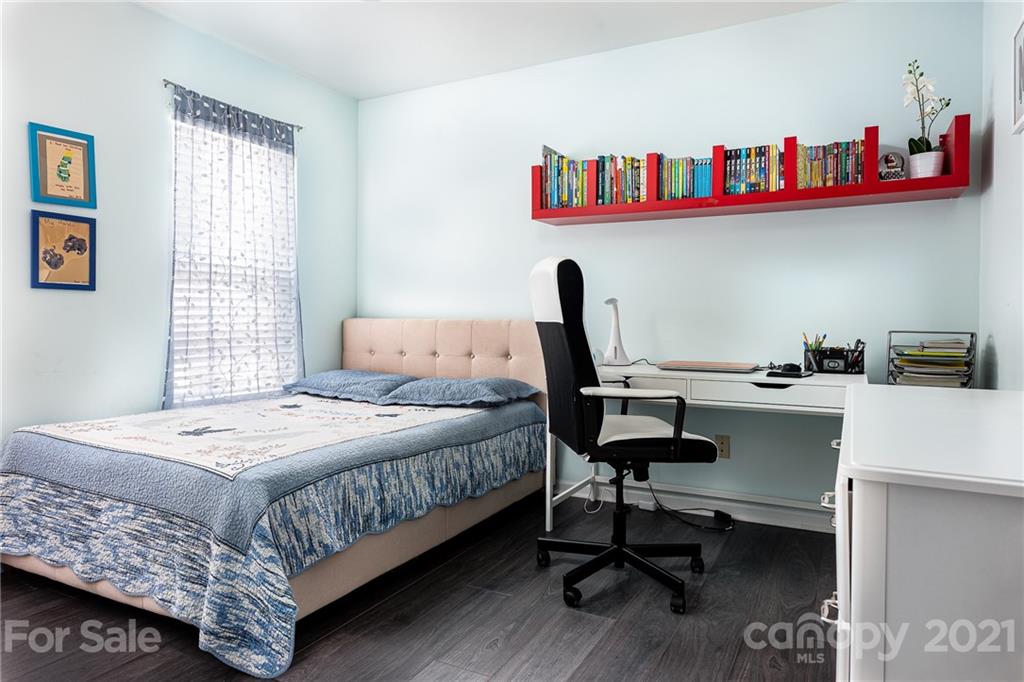 9239 Hillston Ridge Road Huntersville, NC 28078 - Photo 25 of 38 a bedroom with a bed and a table