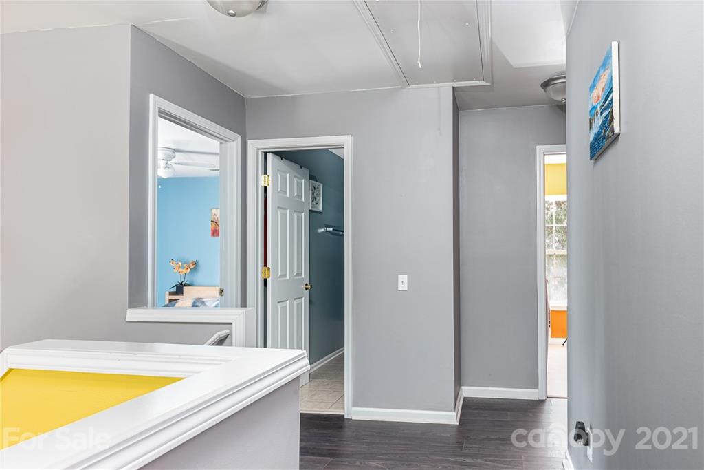 9239 Hillston Ridge Road Huntersville, NC 28078 - Photo 27 of 38 a view of a kitchen with a sink and a refrigerator