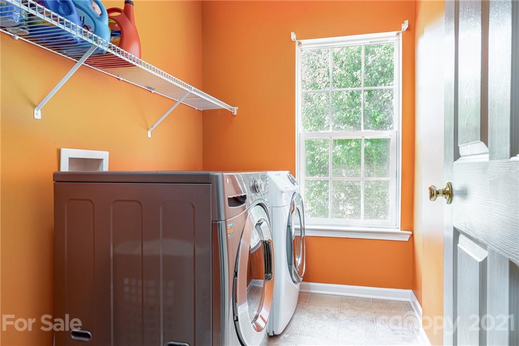 9239 Hillston Ridge Road Huntersville, NC 28078 - Photo 28 of 38 a utility room with dryer and washer