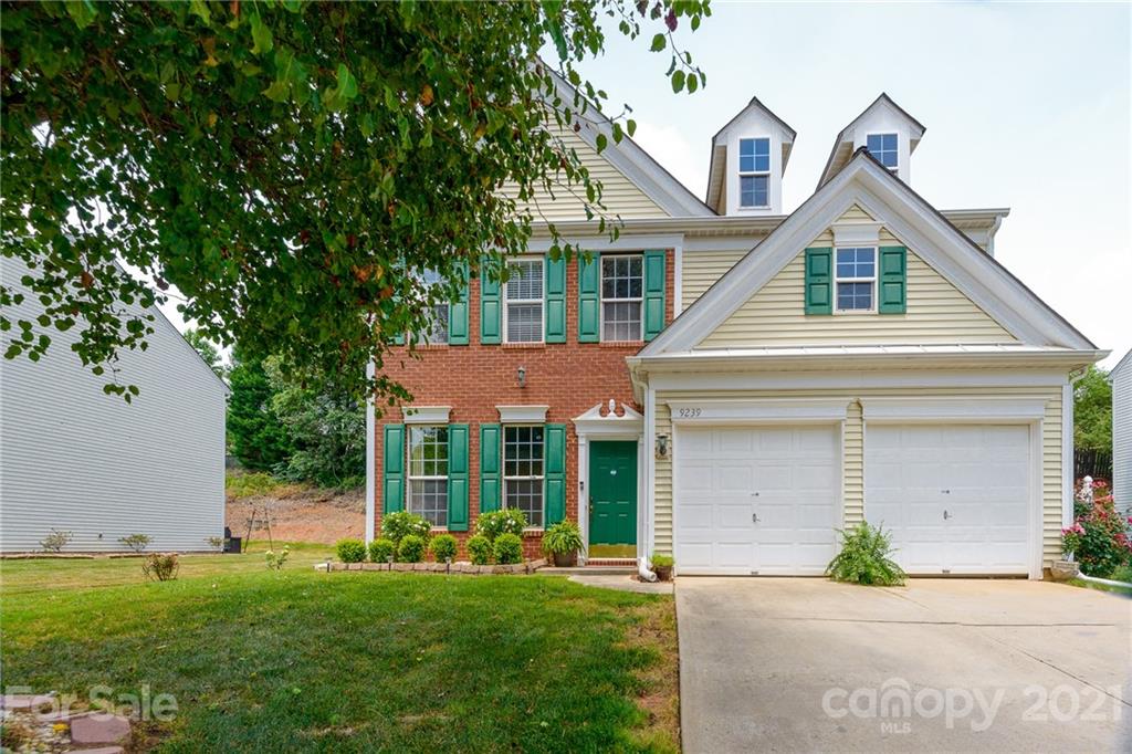 9239 Hillston Ridge Road Huntersville, NC 28078 - Photo 35 of 38 a front view of a house with a yard and garage