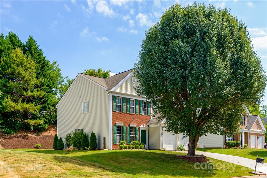 9239 Hillston Ridge Road Huntersville, NC 28078 - Photo 36 of 38 a view of a house with a yard