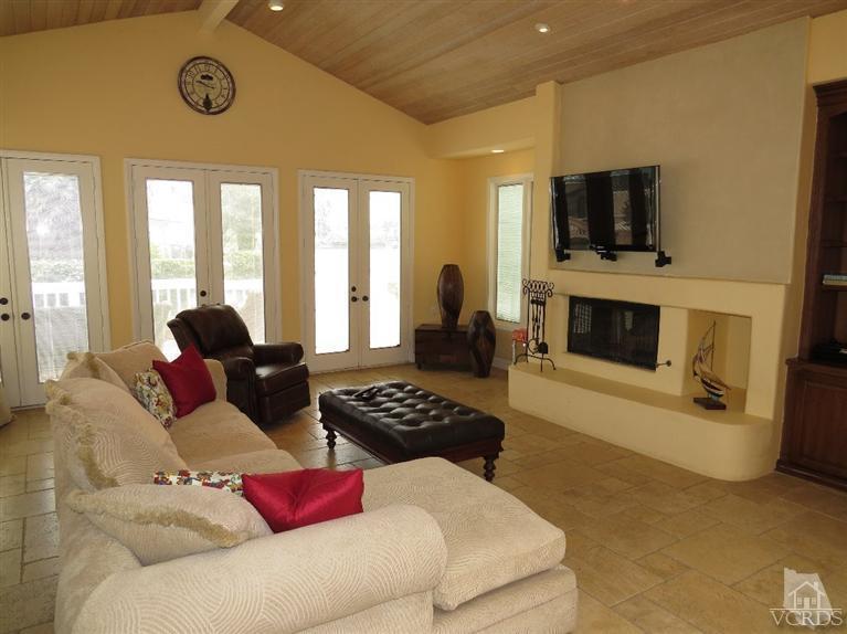 4047 Nice Court Oxnard, CA 93035 - Photo 11 of 31 a living room with furniture and a flat screen tv