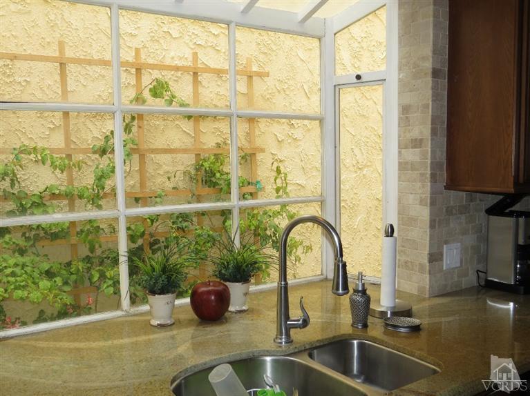 4047 Nice Court Oxnard, CA 93035 - Photo 13 of 31 a kitchen with a sink and a window