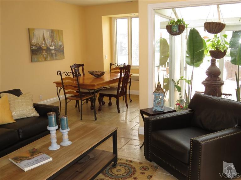 4047 Nice Court Oxnard, CA 93035 - Photo 15 of 31 a dining room with furniture and wooden floor