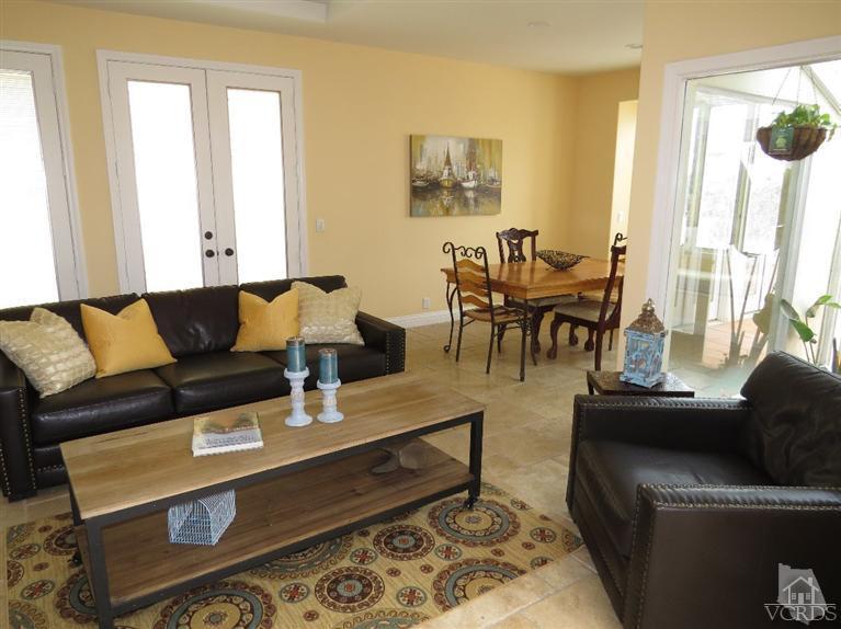 4047 Nice Court Oxnard, CA 93035 - Photo 16 of 31 a living room with furniture and a large window