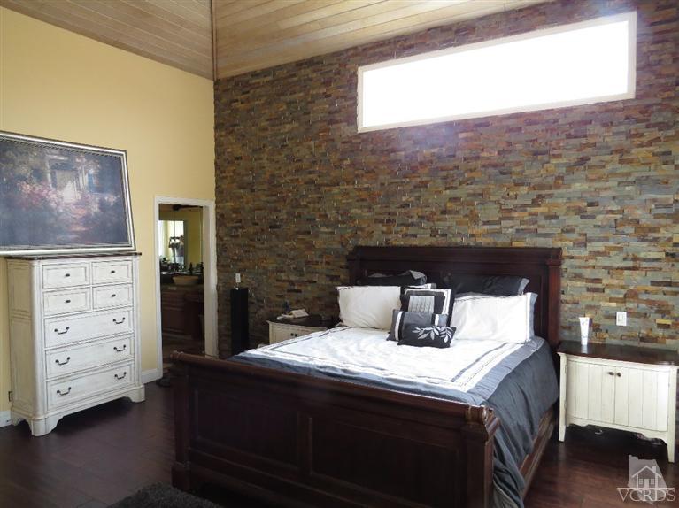 4047 Nice Court Oxnard, CA 93035 - Photo 27 of 31 a bedroom with a bed and a dresser