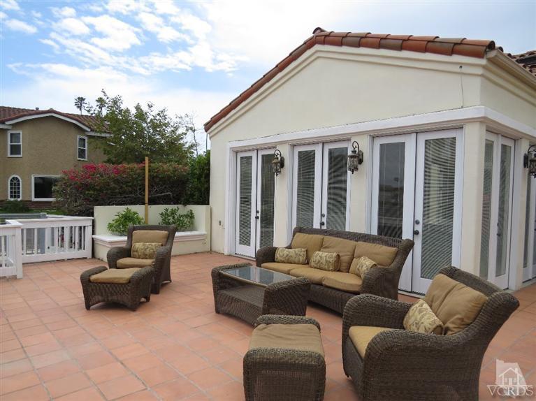 4047 Nice Court Oxnard, CA 93035 - Photo 4 of 31 a view of a patio with couches chairs and wooden floor