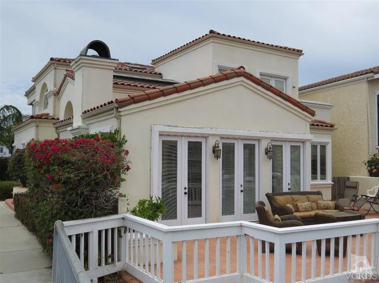 4047 Nice Court Oxnard, CA 93035 - Photo 6 of 31 a front view of a house with a garden