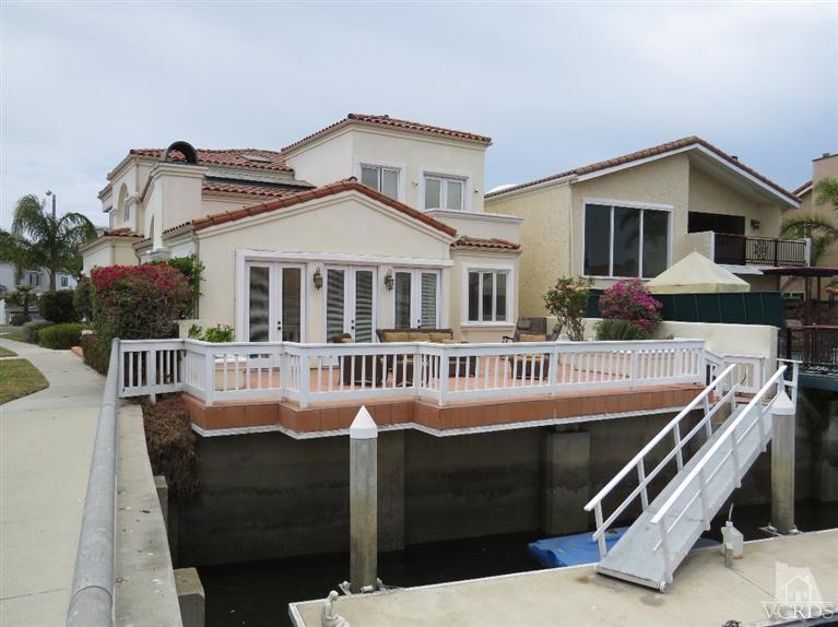 4047 Nice Court Oxnard, CA 93035 - Photo 7 of 31 a front view of a house with balcony