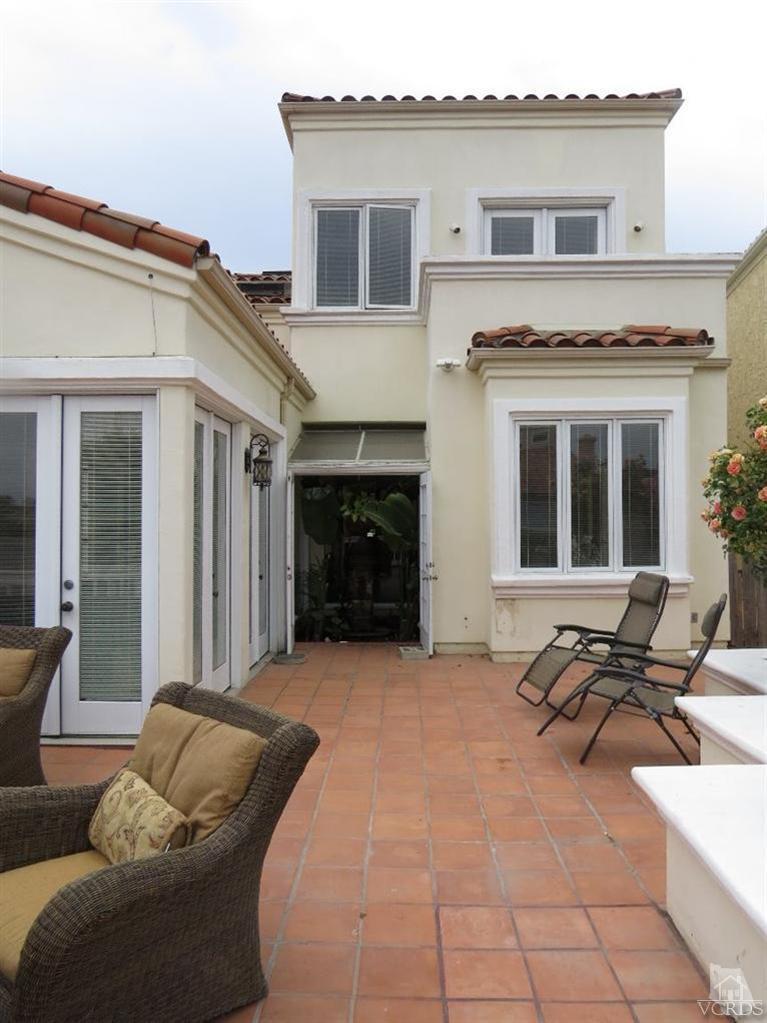 4047 Nice Court Oxnard, CA 93035 - Photo 9 of 31 a view of a house with couches and a fireplace
