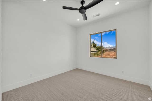 1620 Belayer Drive St. George, UT 84770 - Photo 33 of 51 Spacious room featuring a large window, recessed lighting, and a modern ceiling fan