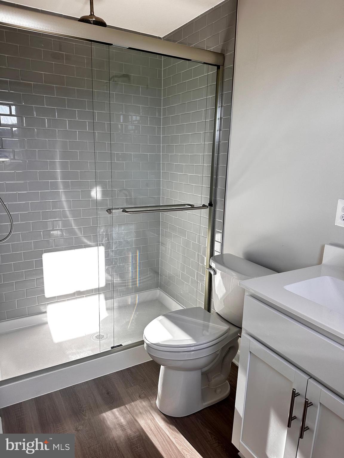 30 Trotting Road Inwood, WV 25428 - Photo 45 of 61 a white toilet sitting next to a bathroom sink
