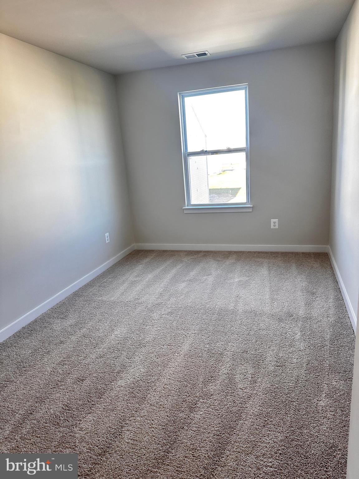 30 Trotting Road Inwood, WV 25428 - Photo 52 of 61 an empty room with a window