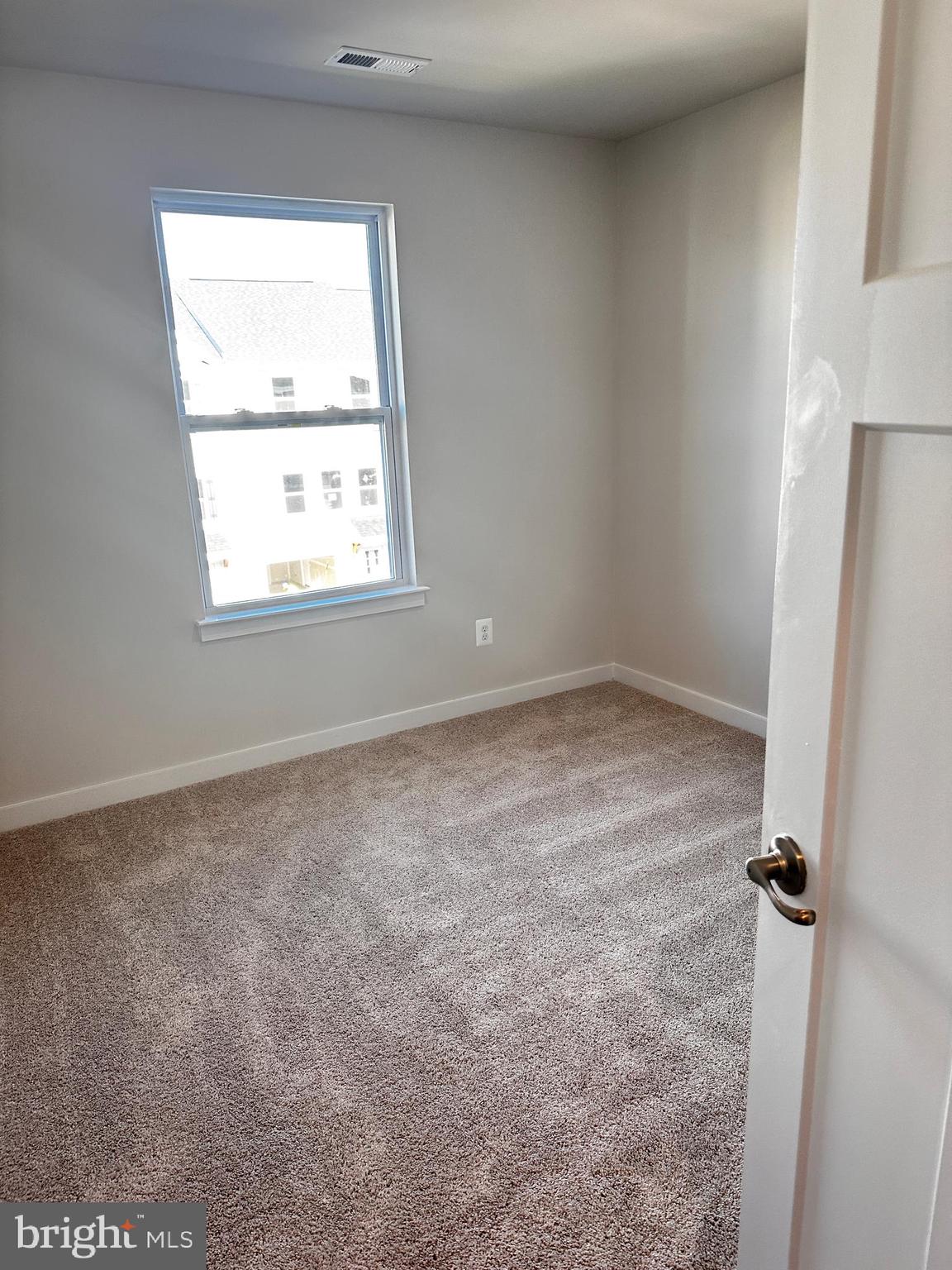 30 Trotting Road Inwood, WV 25428 - Photo 58 of 61 an empty room with a window