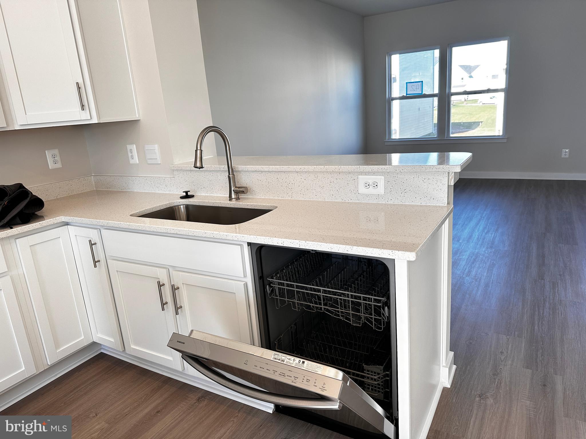 30 Trotting Road Inwood, WV 25428 - Photo 61 of 61 a kitchen with a sink stove and cabinets