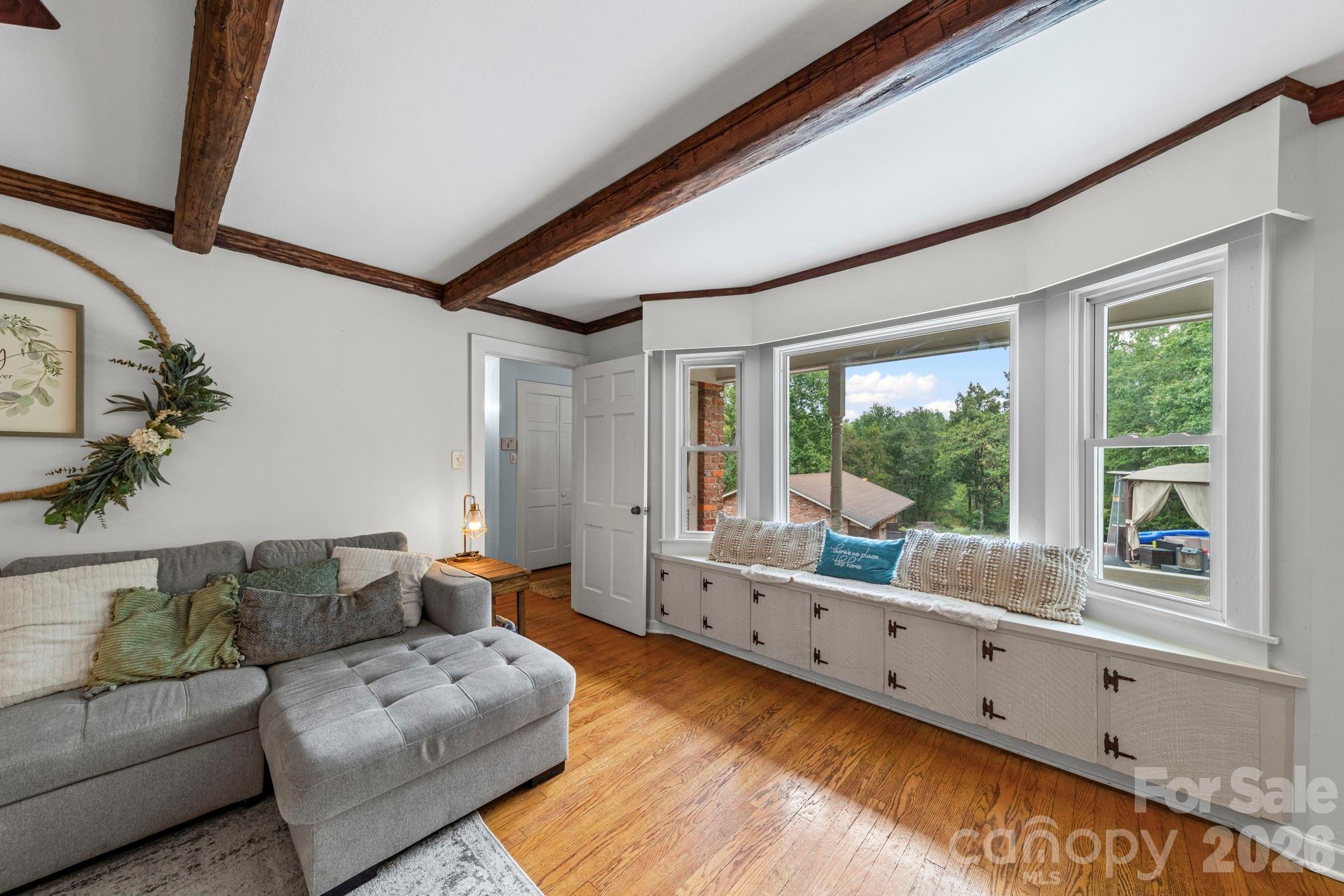 417 Park Ridge Road Albemarle, NC 28001 - Photo 18 of 47 a living room with furniture and a large window