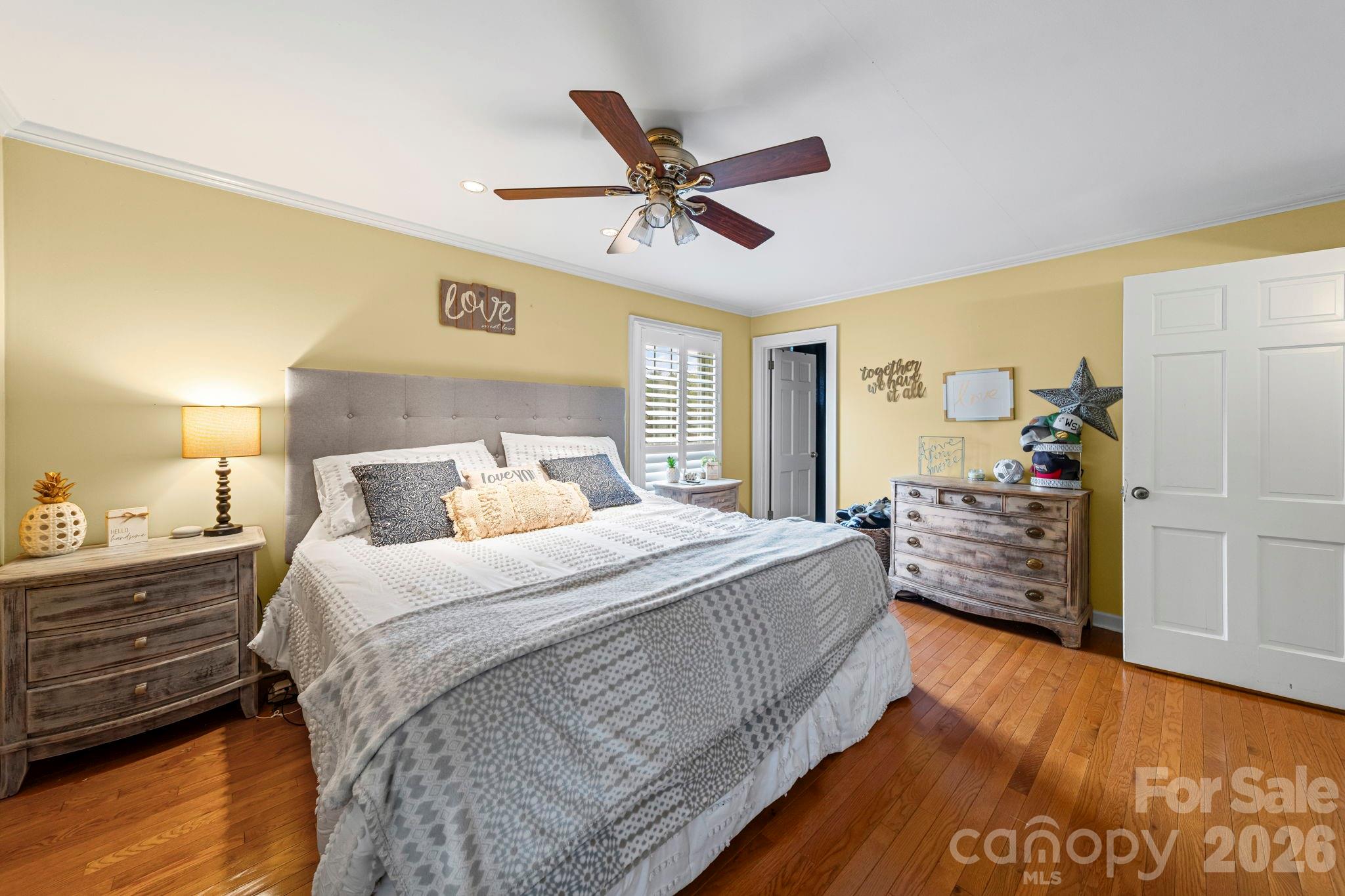 417 Park Ridge Road Albemarle, NC 28001 - Photo 22 of 47 a bedroom with a bed and ceiling fan