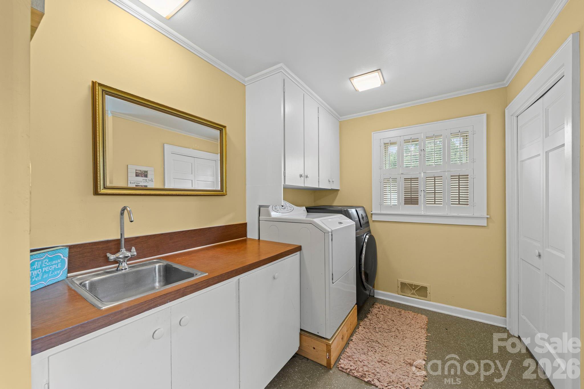 417 Park Ridge Road Albemarle, NC 28001 - Photo 26 of 47 a bathroom with a sink and a window