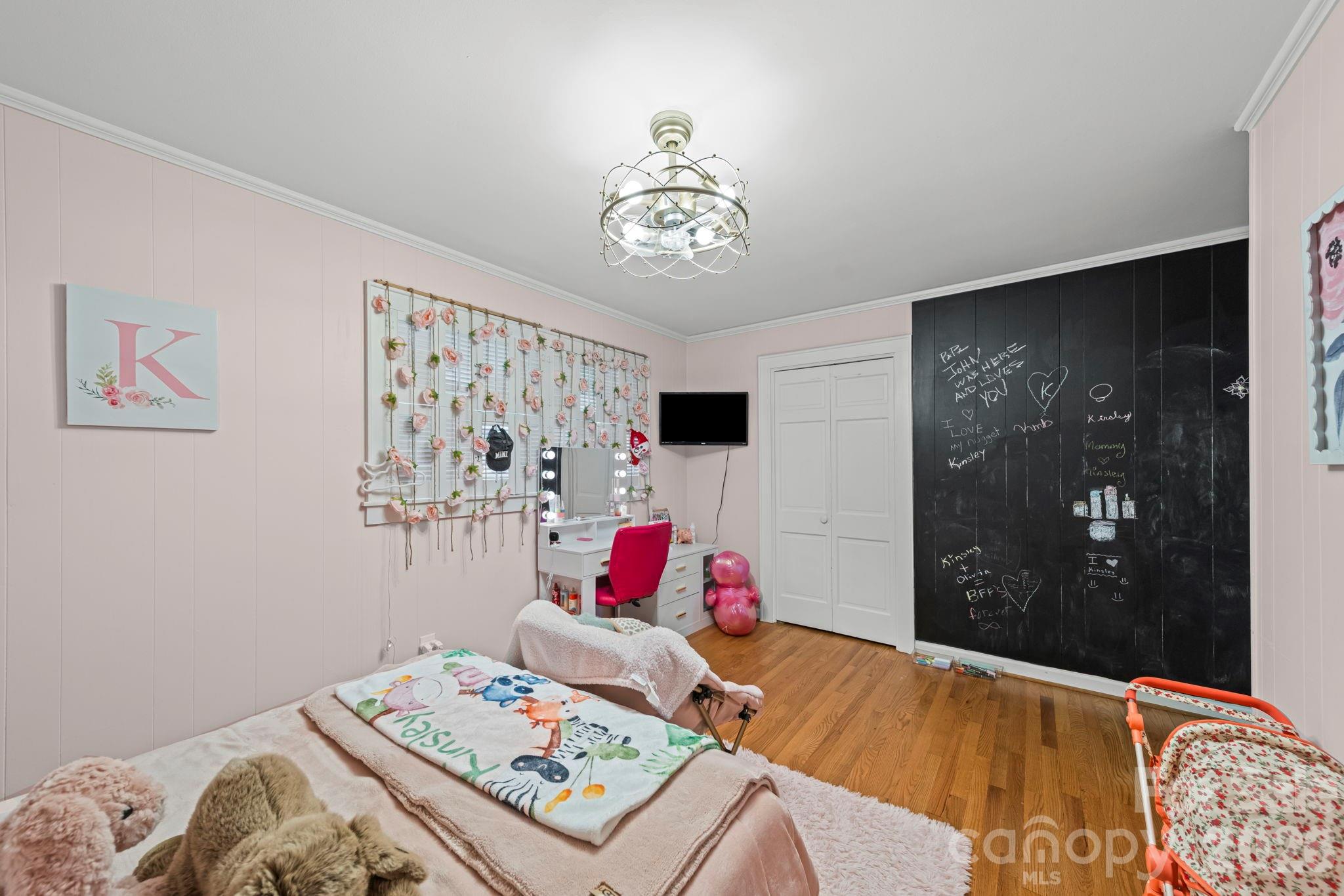 417 Park Ridge Road Albemarle, NC 28001 - Photo 31 of 47 a bedroom with a bed and a couch