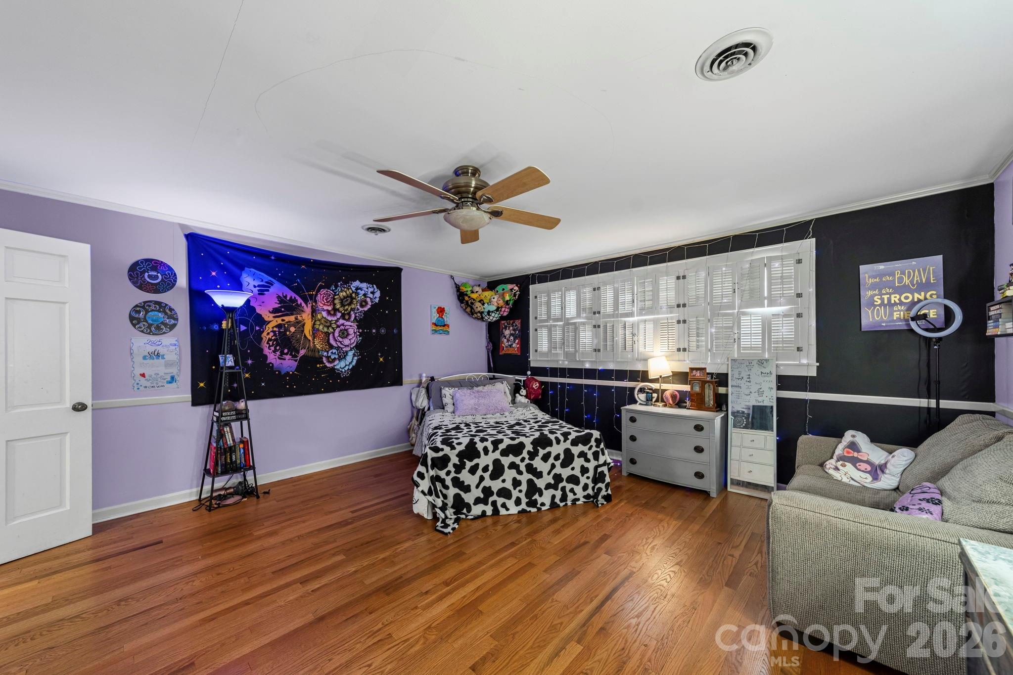 417 Park Ridge Road Albemarle, NC 28001 - Photo 33 of 47 a living room with couch and a flat screen tv