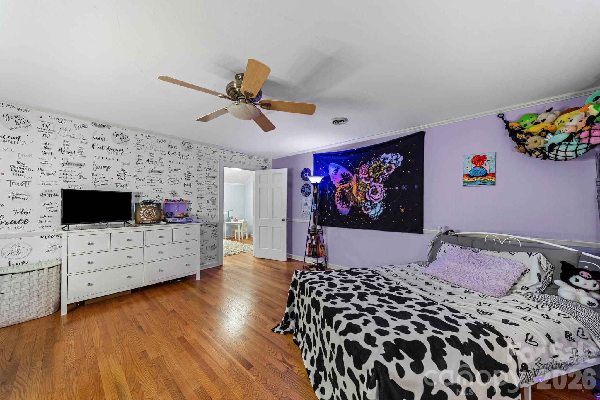 417 Park Ridge Road Albemarle, NC 28001 - Photo 34 of 47 a bedroom with a bed and furniture