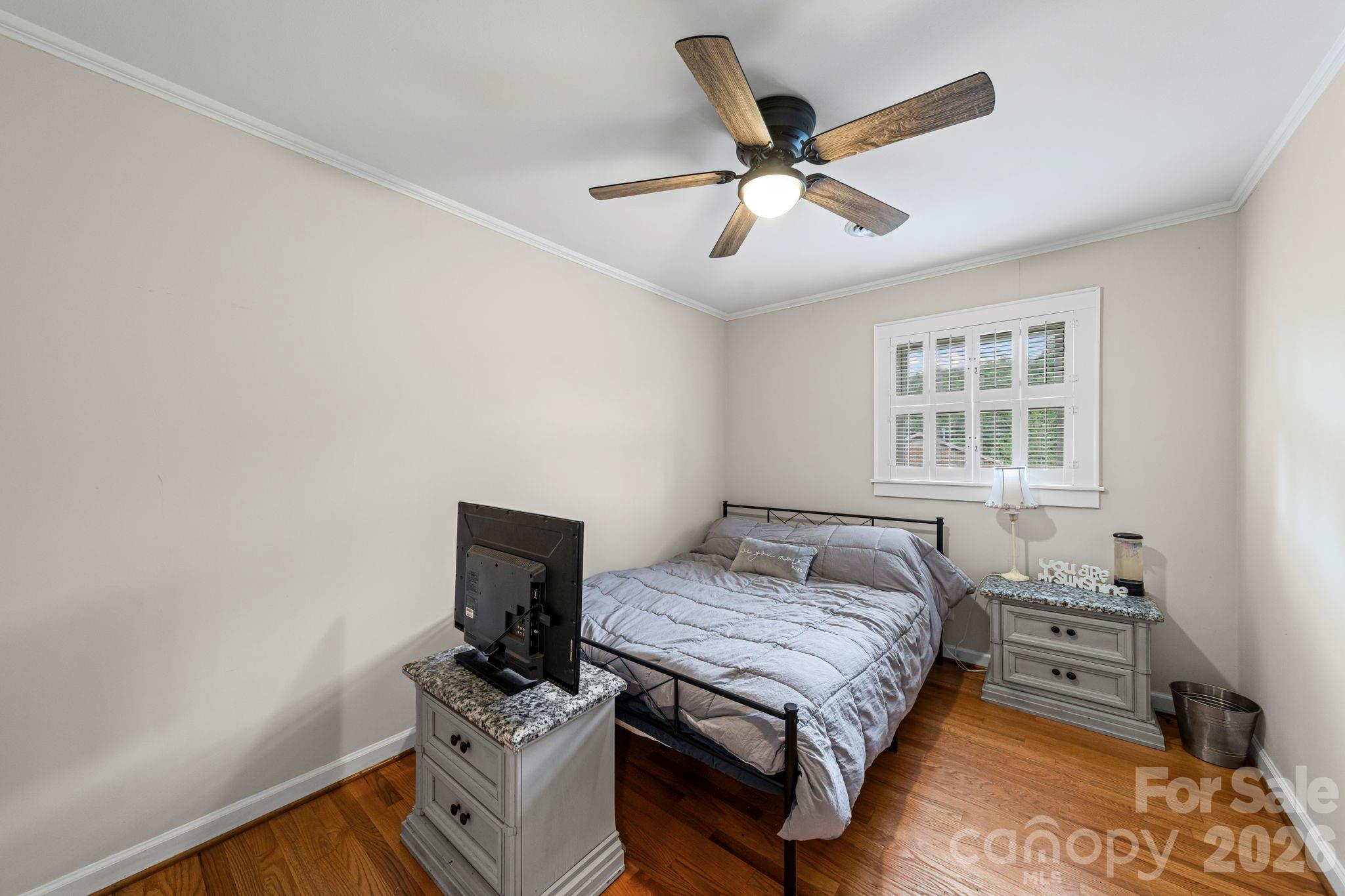 417 Park Ridge Road Albemarle, NC 28001 - Photo 35 of 47 a bedroom with a bed and a window