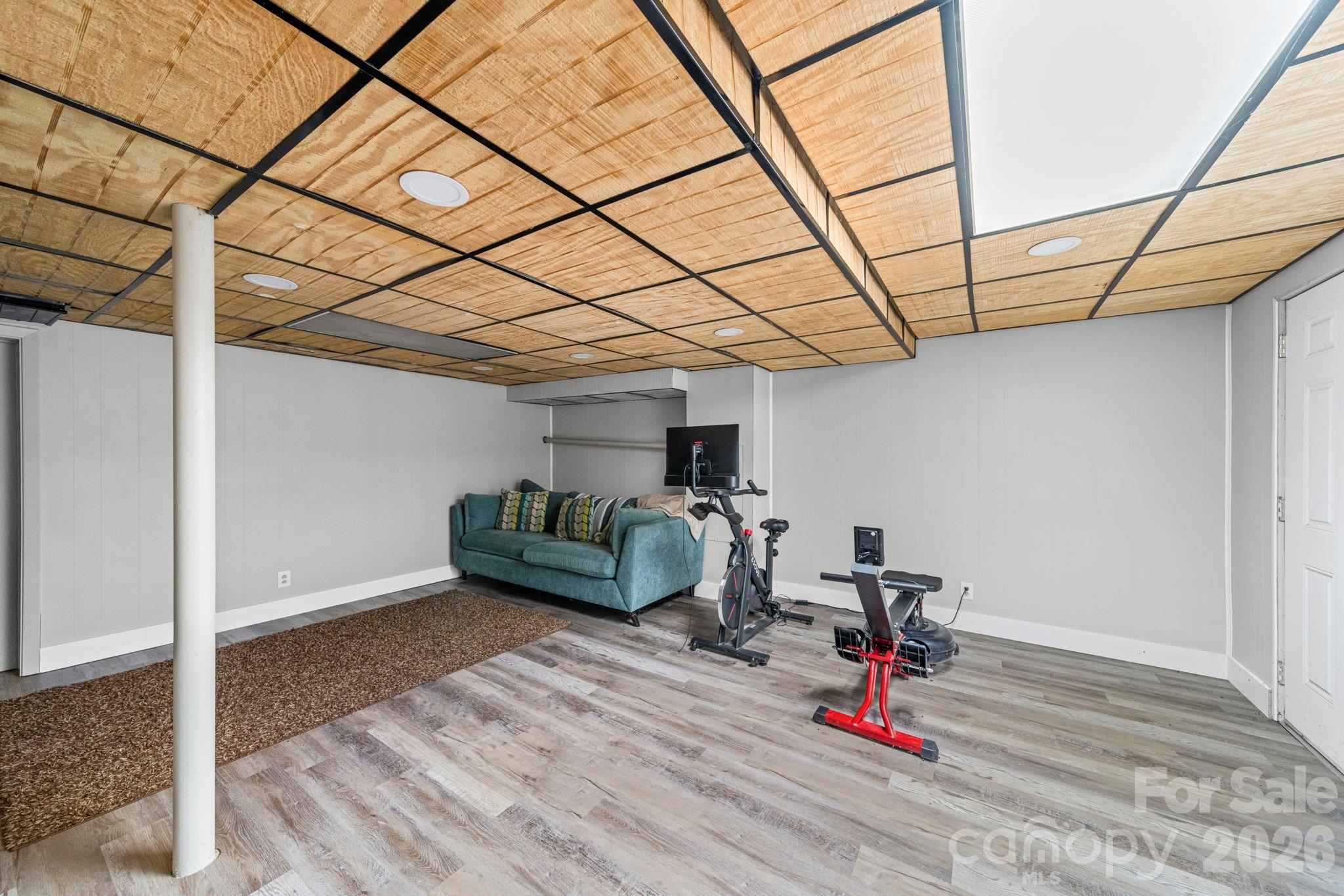 417 Park Ridge Road Albemarle, NC 28001 - Photo 39 of 47 a living room with furniture and wooden floor