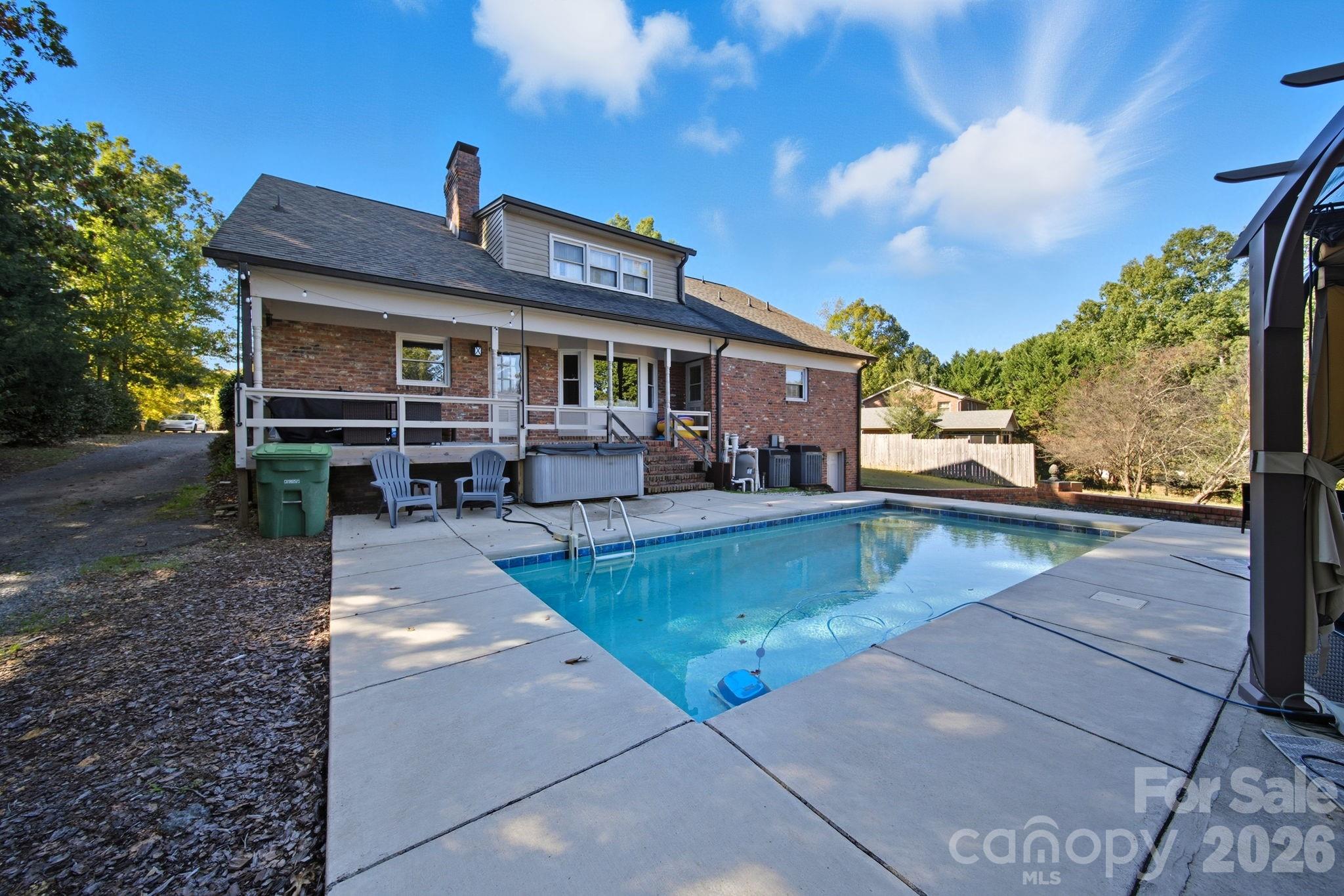 417 Park Ridge Road Albemarle, NC 28001 - Photo 47 of 47 a view of a house with backyard porch and sitting area