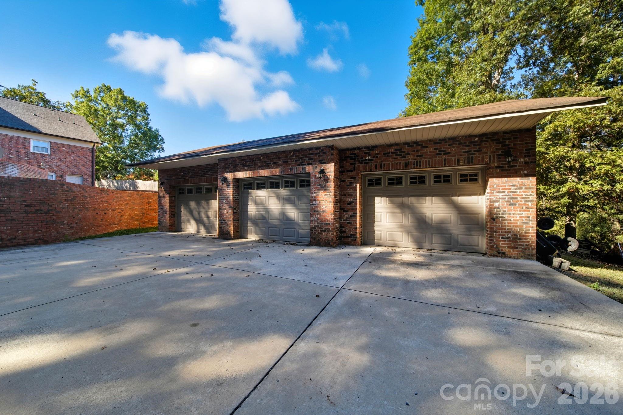 417 Park Ridge Road Albemarle, NC 28001 - Photo 6 of 47 a front view of a house with garden