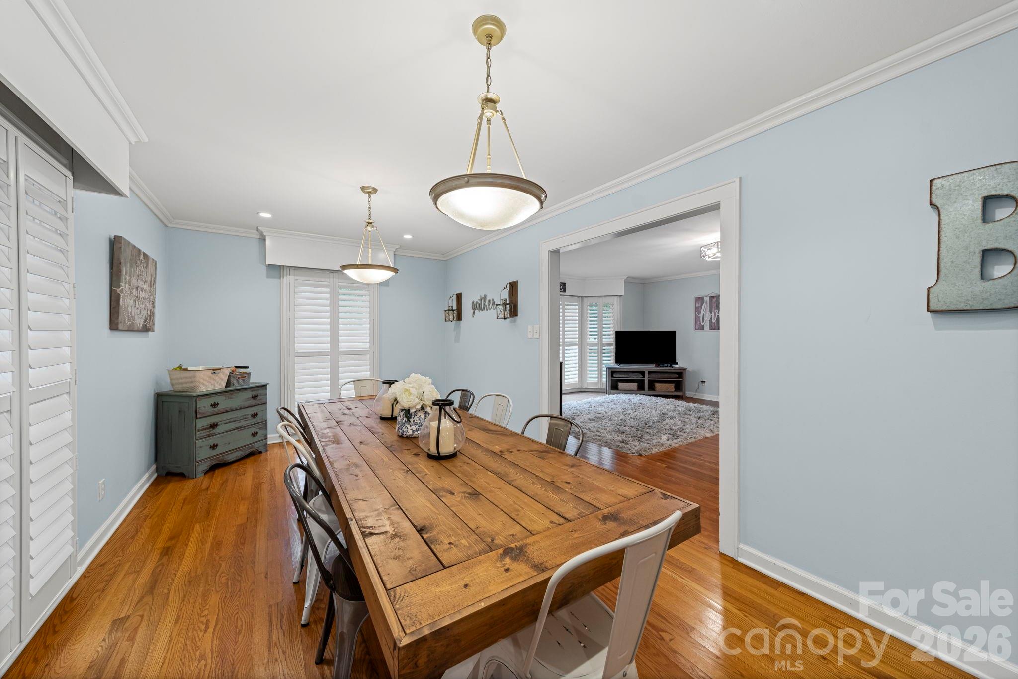 417 Park Ridge Road Albemarle, NC 28001 - Photo 9 of 47 a dining room with a table and chairs