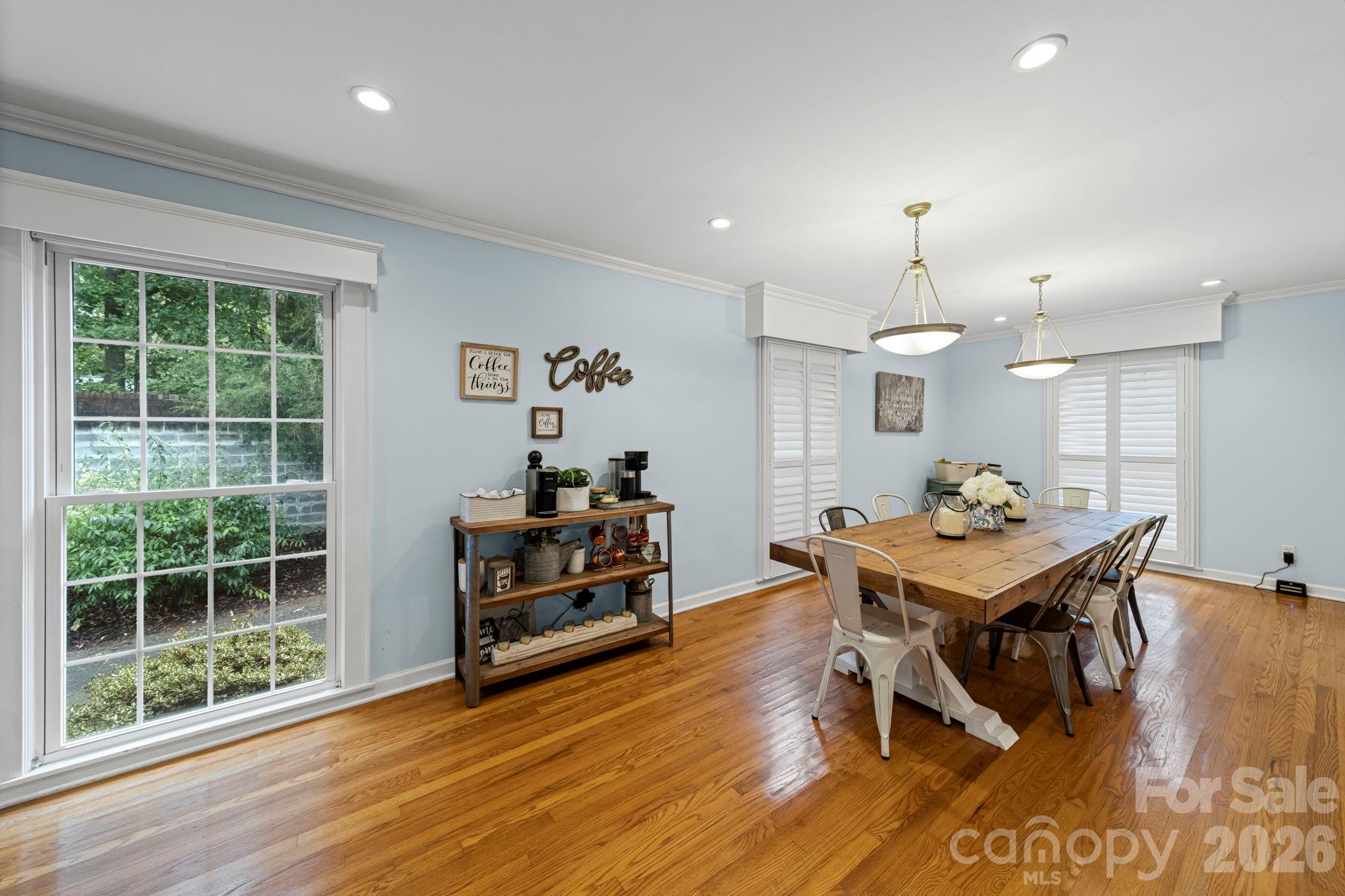 417 Park Ridge Road Albemarle, NC 28001 - Photo 10 of 47 a view of a dining room with furniture window and wooden floor