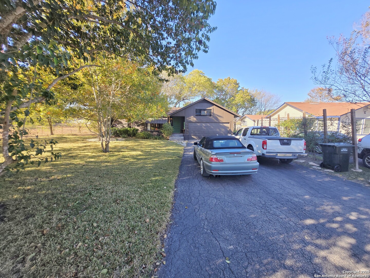 5564 Farm To Market Road 1103 Schertz, TX 78108 - Photo 2 of 35 a car parked in front of a house