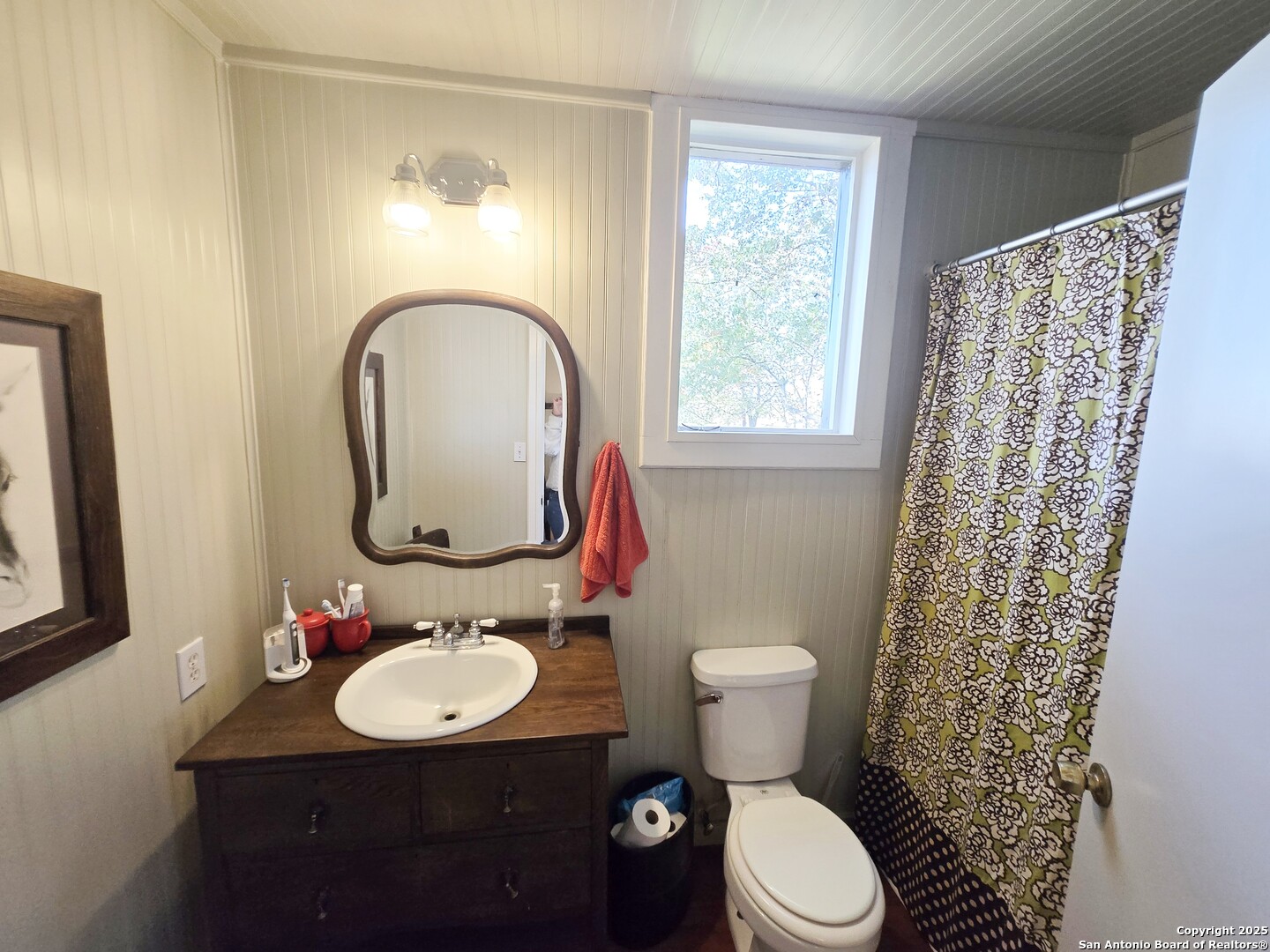 5564 Farm To Market Road 1103 Schertz, TX 78108 - Photo 26 of 35 a bathroom with a sink toilet and a mirror