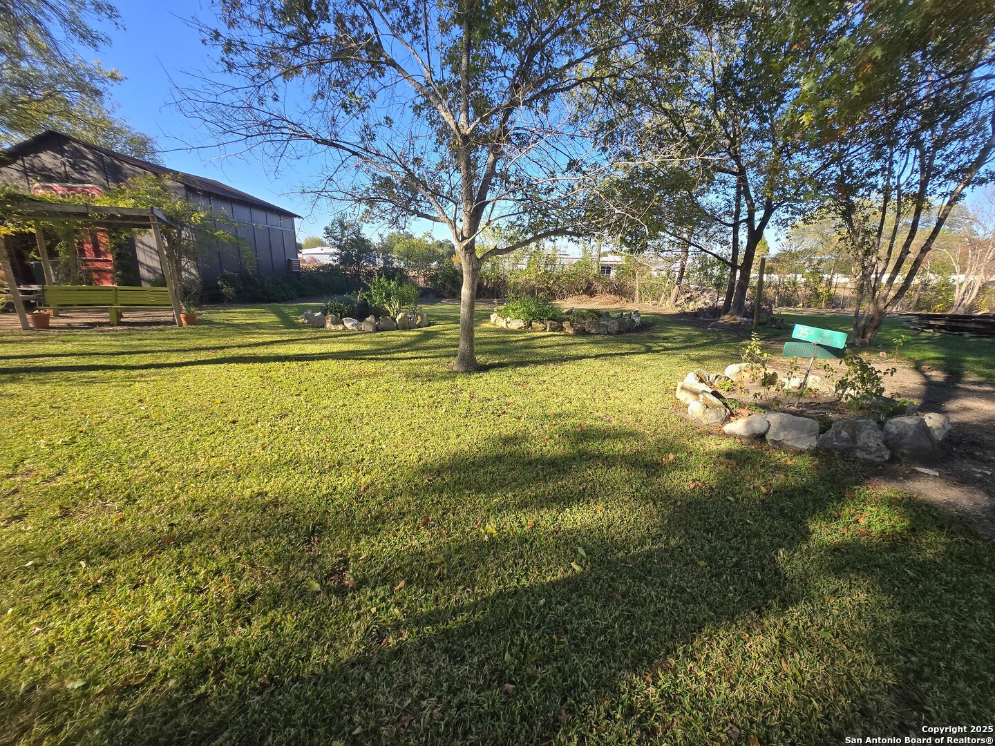 5564 Farm To Market Road 1103 Schertz, TX 78108 - Photo 28 of 35 a swimming pool with outdoor seating and yard