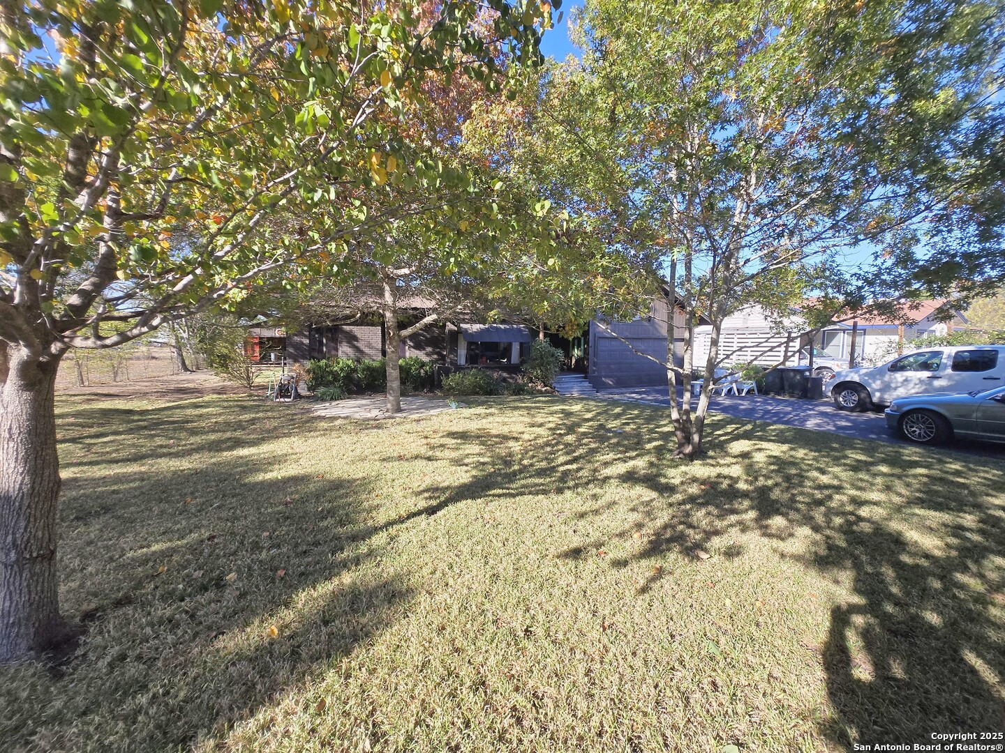 5564 Farm To Market Road 1103 Schertz, TX 78108 - Photo 3 of 35 a view of a yard with wooden fence