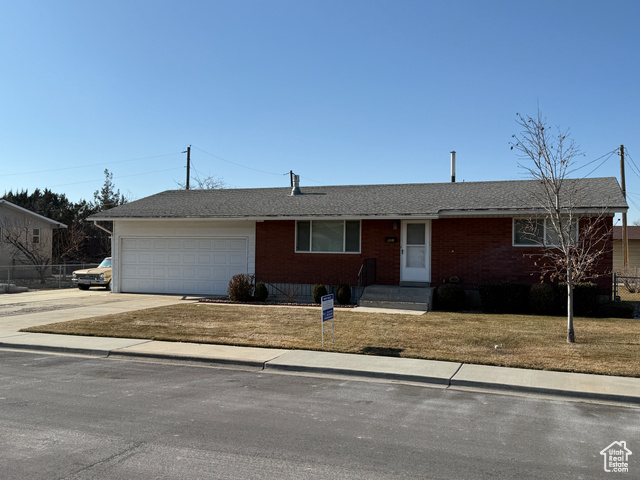 331 200 East Orem, UT 84057 - Photo 1 of 1 Single story home with a garage and a front yard