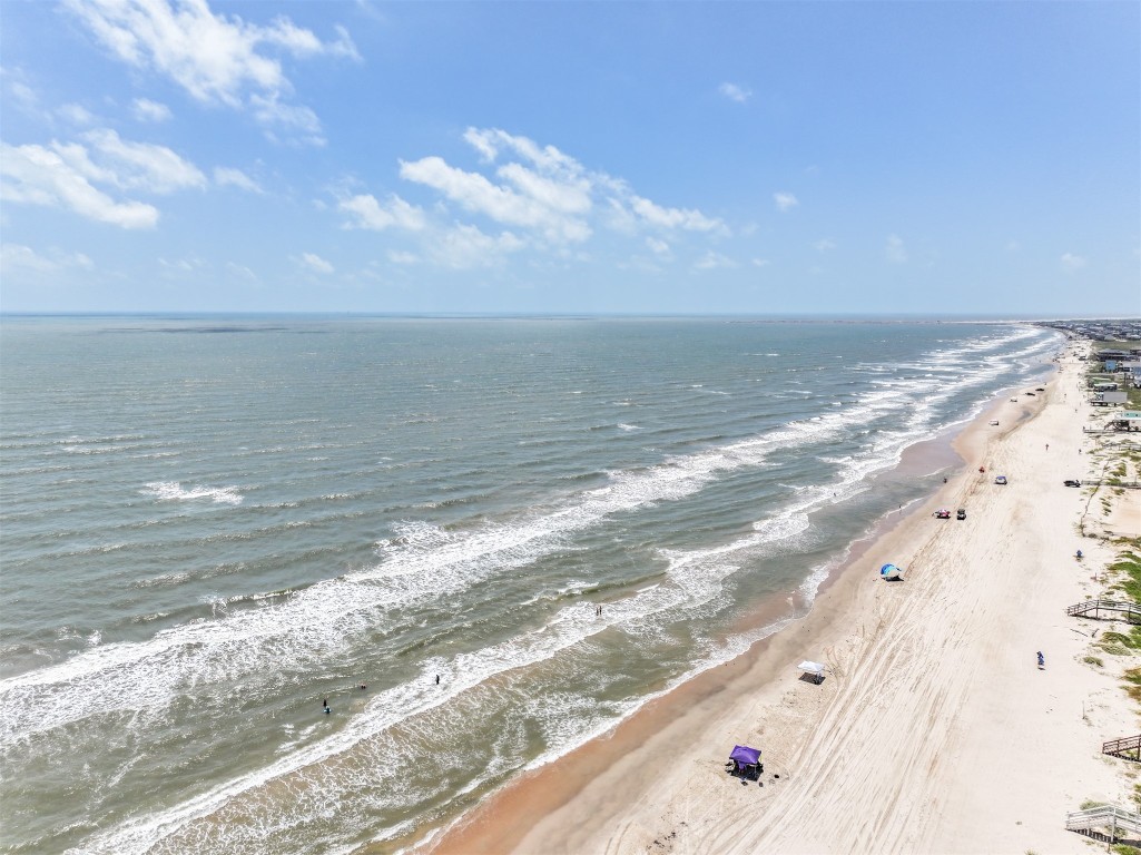 143 West Palm Surfside Beach, TX 77541 - Photo 35 of 38 a view of an ocean beach