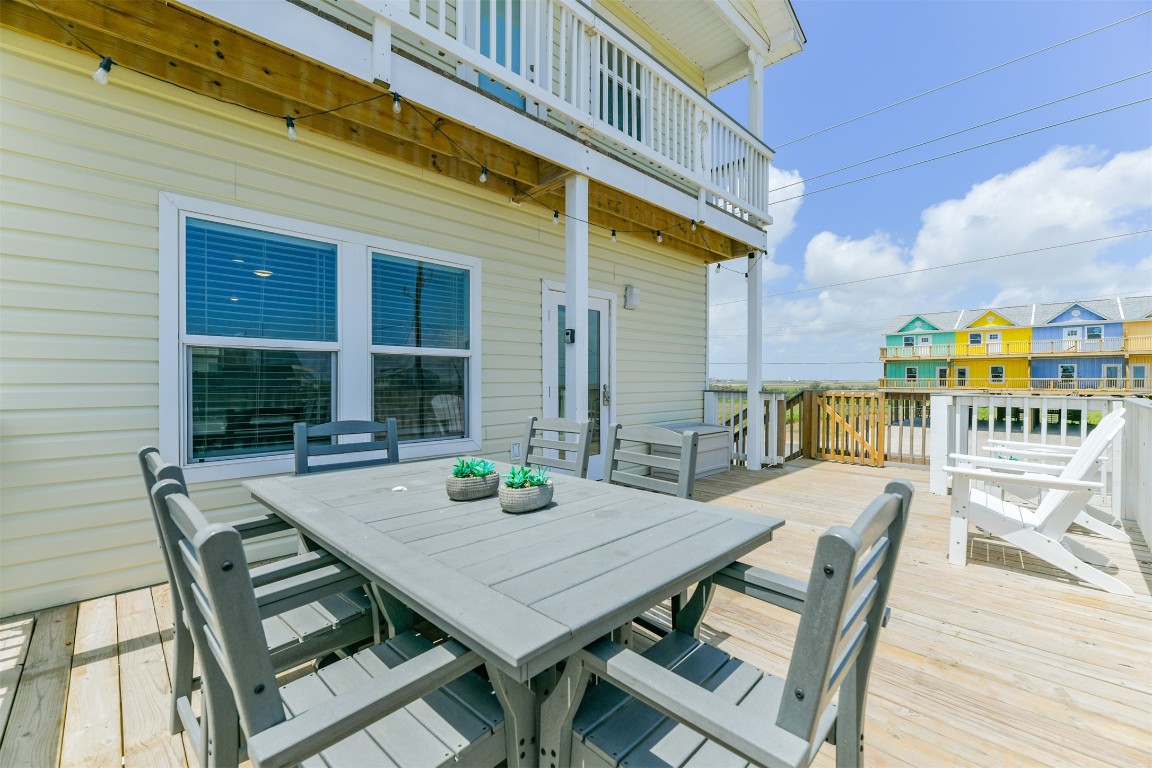 143 West Palm Surfside Beach, TX 77541 - Photo 5 of 38 a view of an outside dining space with furniture