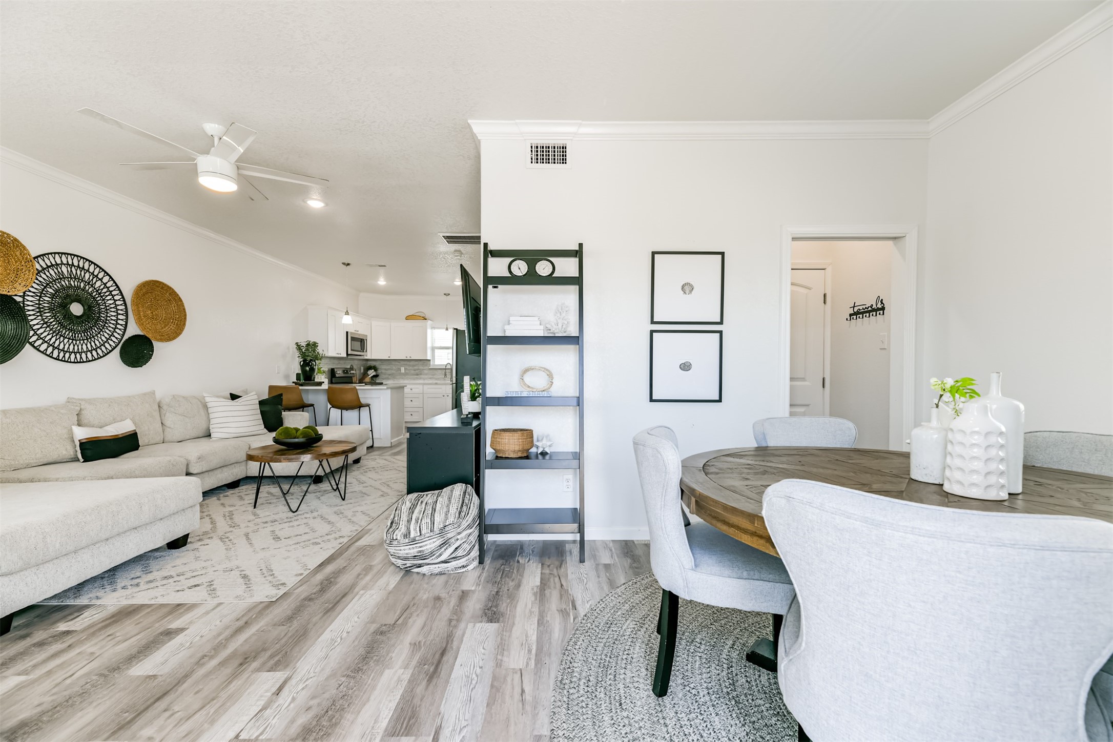 143 West Palm Surfside Beach, TX 77541 - Photo 7 of 38 a living room with furniture and wooden floor