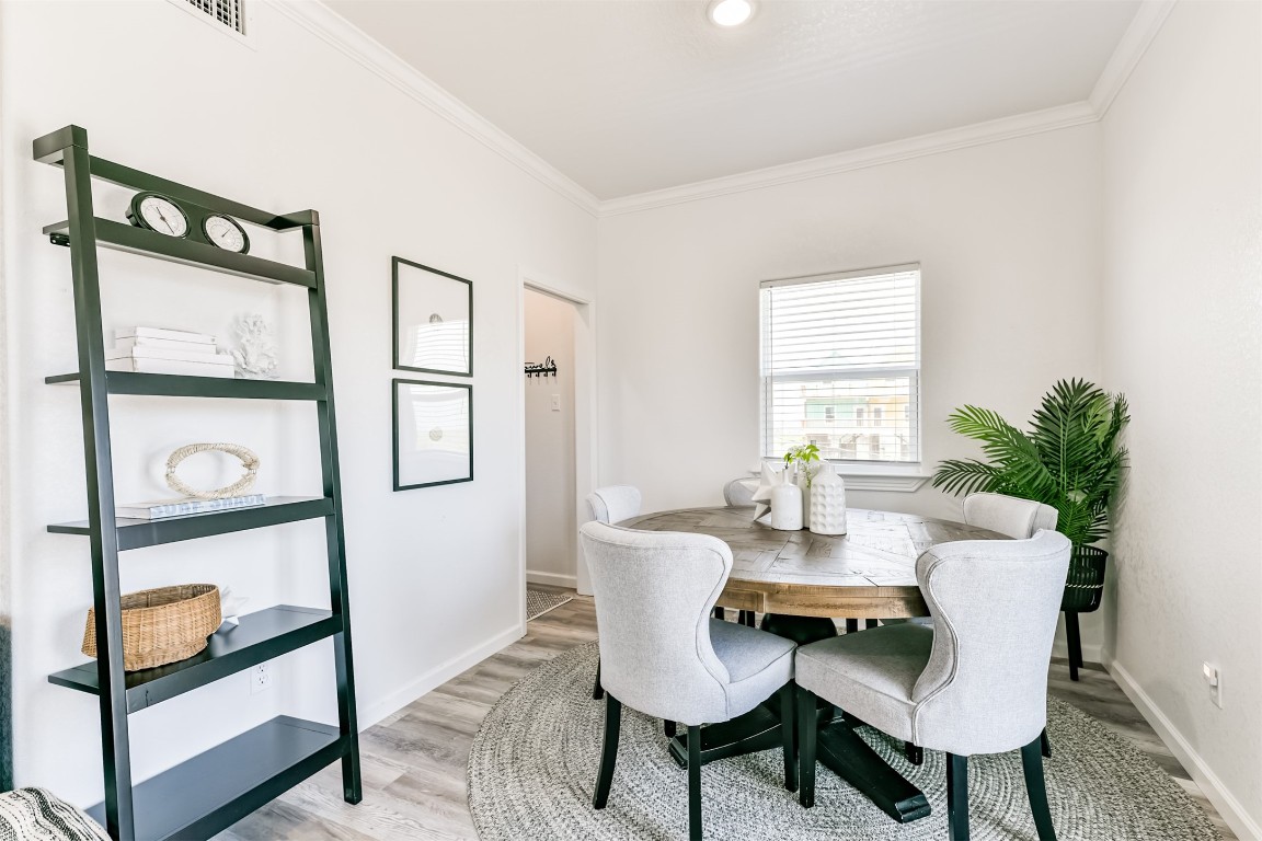 143 West Palm Surfside Beach, TX 77541 - Photo 9 of 38 Dining area, with the laundry room back to the left.