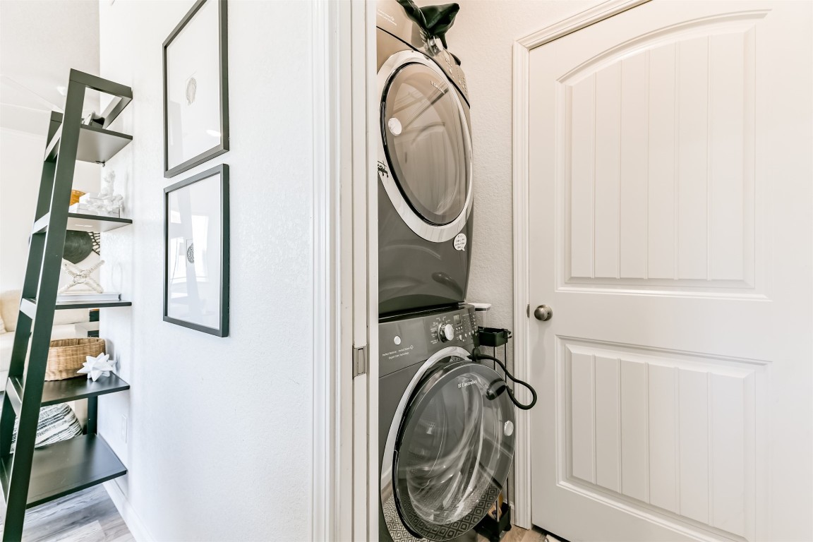 143 West Palm Surfside Beach, TX 77541 - Photo 10 of 38 a utility room with dryer and washer