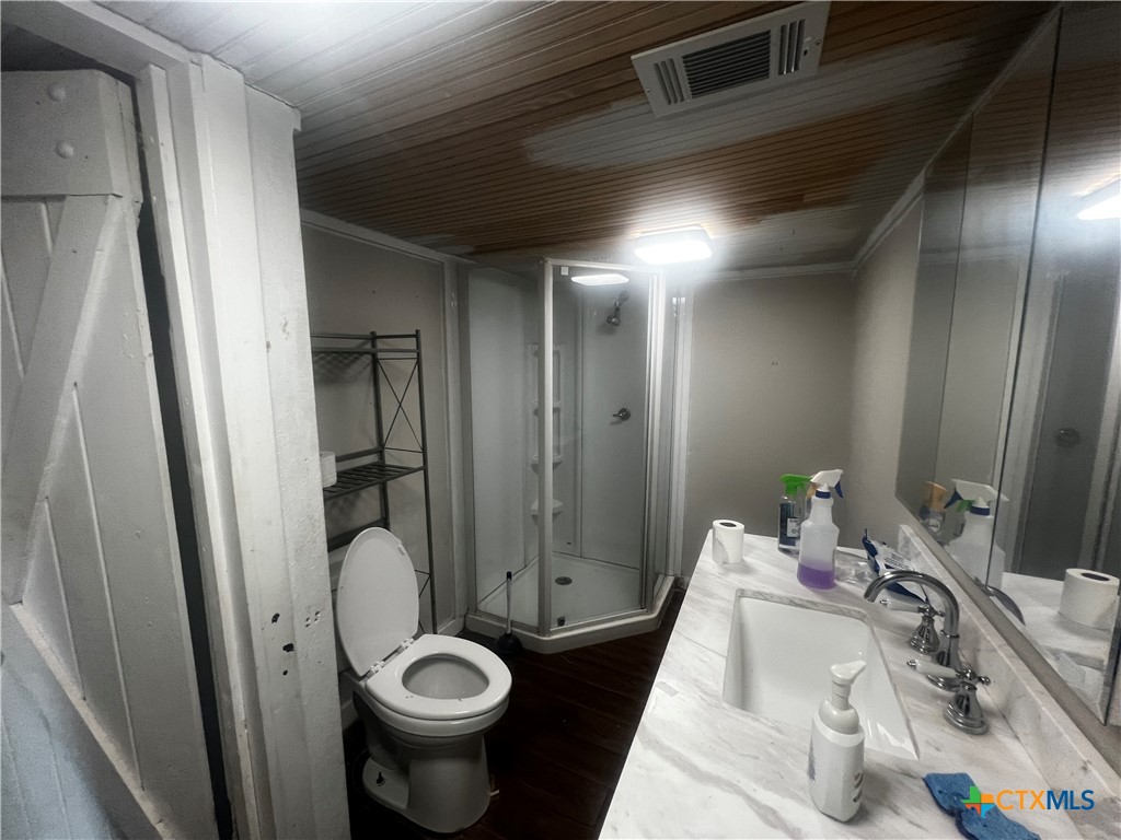 605 East Rogers Cemetery Road Rogers, TX 76569 - Photo 14 of 29 a bathroom with a sink and toilet