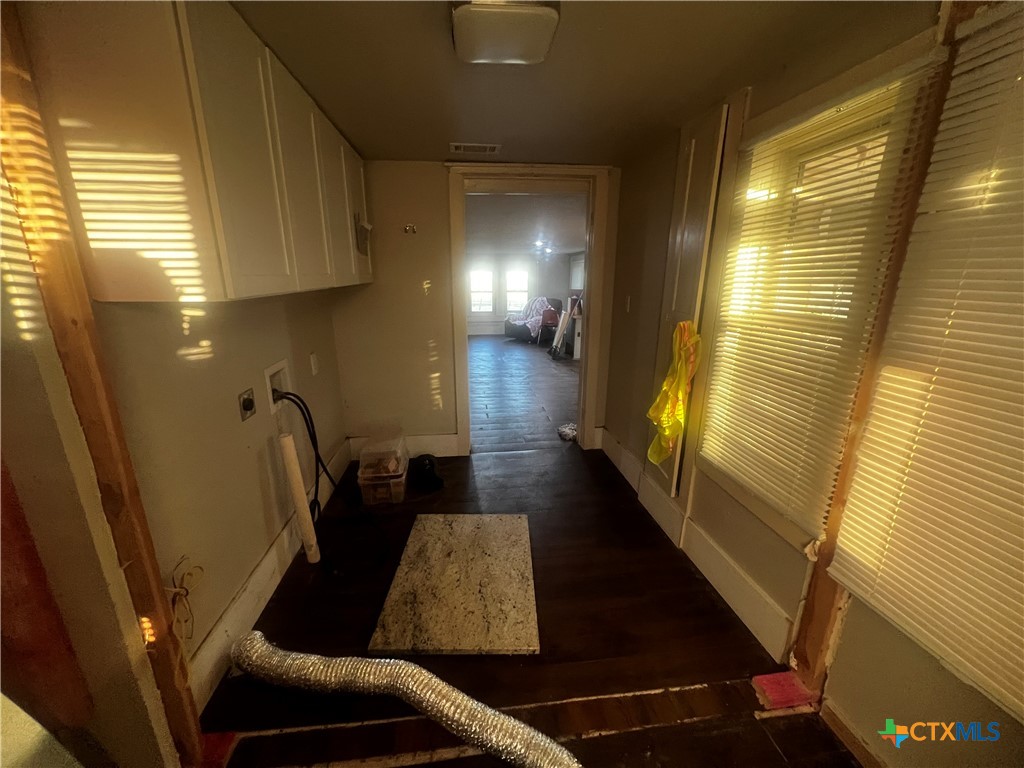 605 East Rogers Cemetery Road Rogers, TX 76569 - Photo 24 of 29 a view of entryway and hall with wooden floor